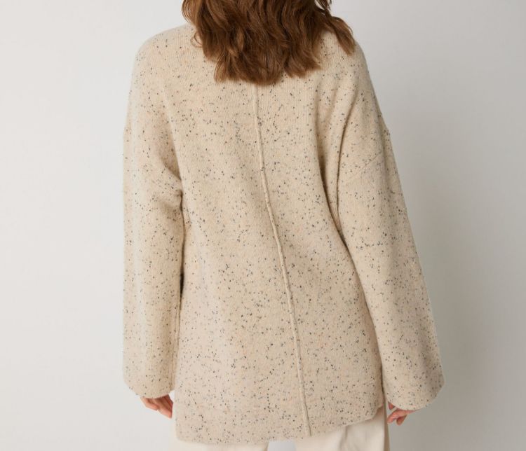 Immagine di Maglia dolcevita in lana con spacchi