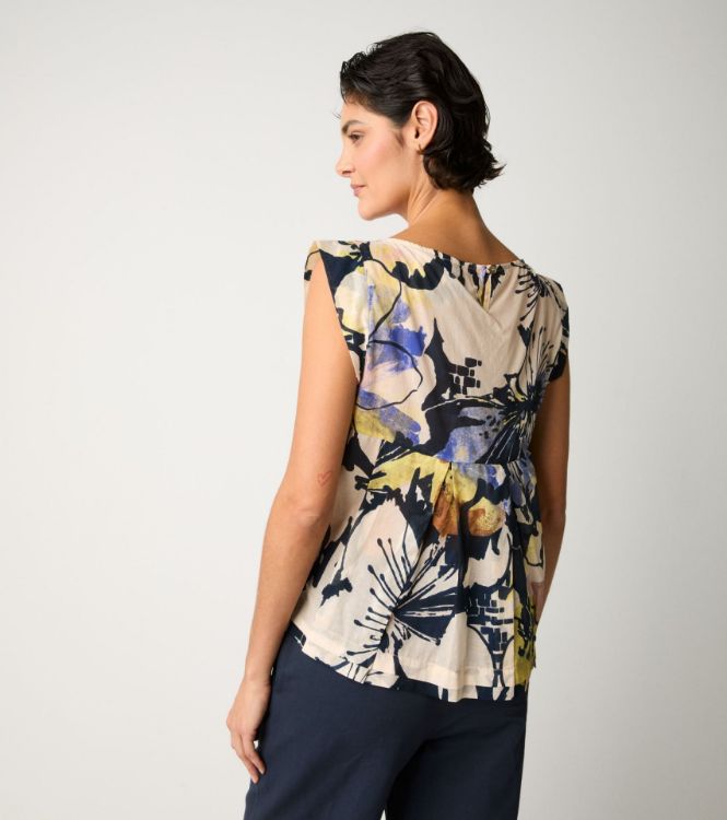 Top floreale con scollo a barca fiore